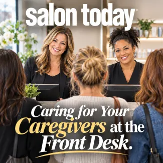 Two receptionists waiting on guests in a salon