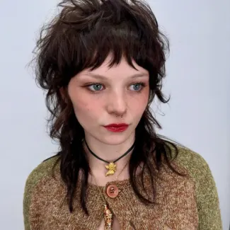 A young woman with a mullet