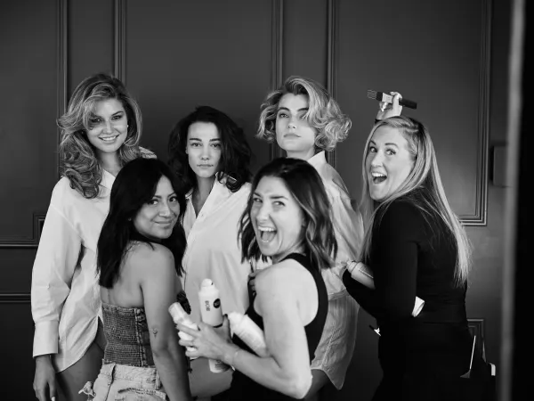 A group of hairstylists and models