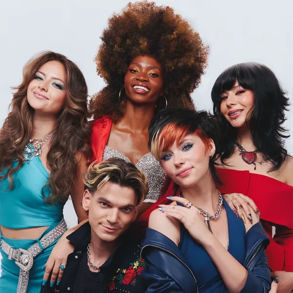 a group of people with bold hairstyles