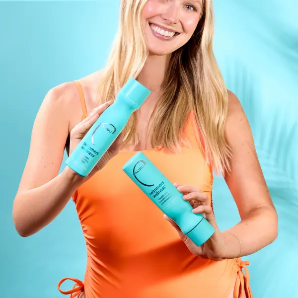 Woman with blonde hair and in a swimsuit