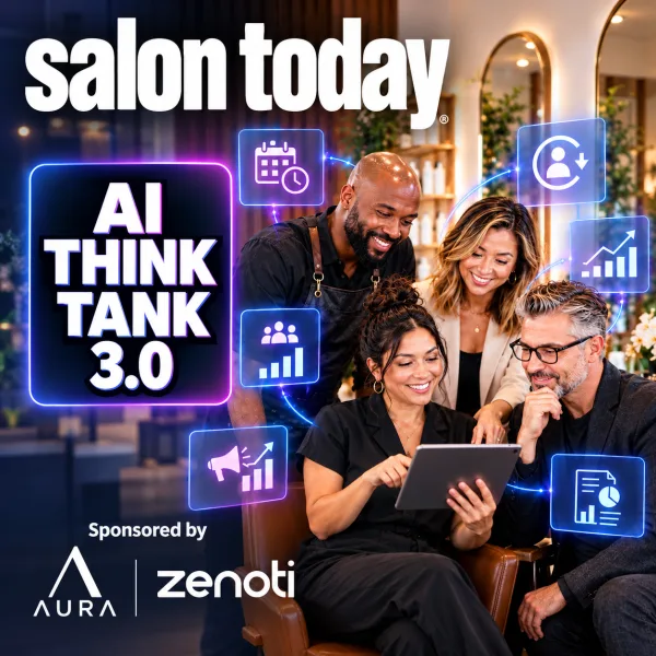 Team members gather around an ipad