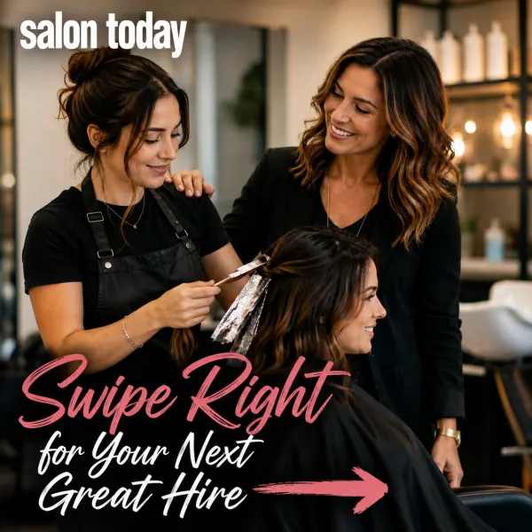 An owner encourages a young stylist