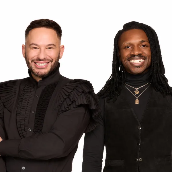 Three people in black