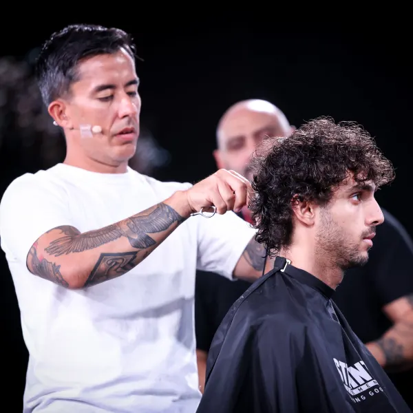 A man cuts a man's hair