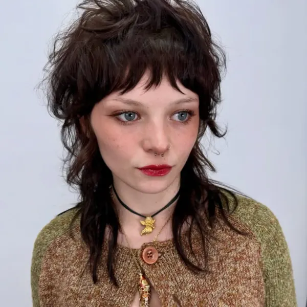 A young woman with a mullet