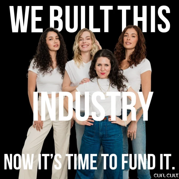 Four women in jeans and tshirts