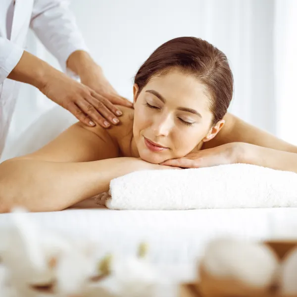 A woman receiving a massage.