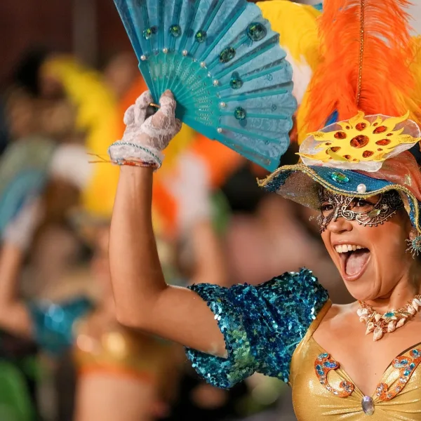 A woman in costume celebrates