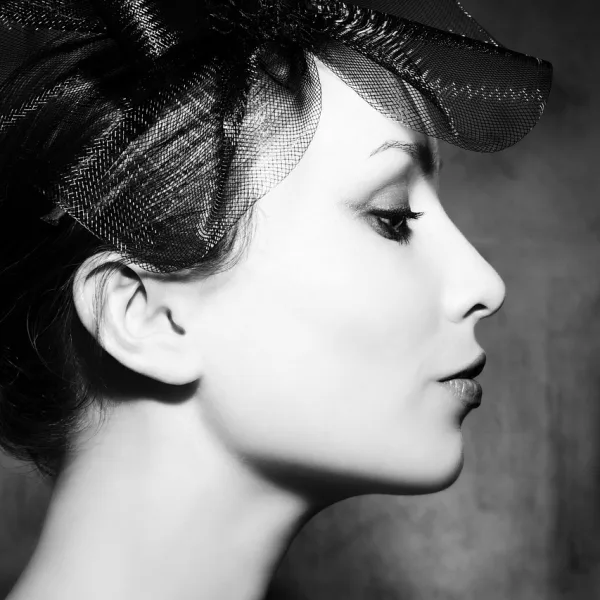 A youthful female model in profile.