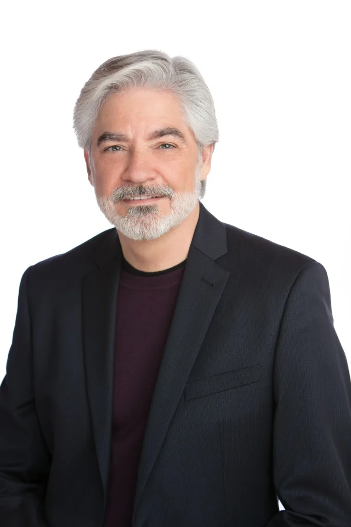 Alain Audet in black blazer and shirt