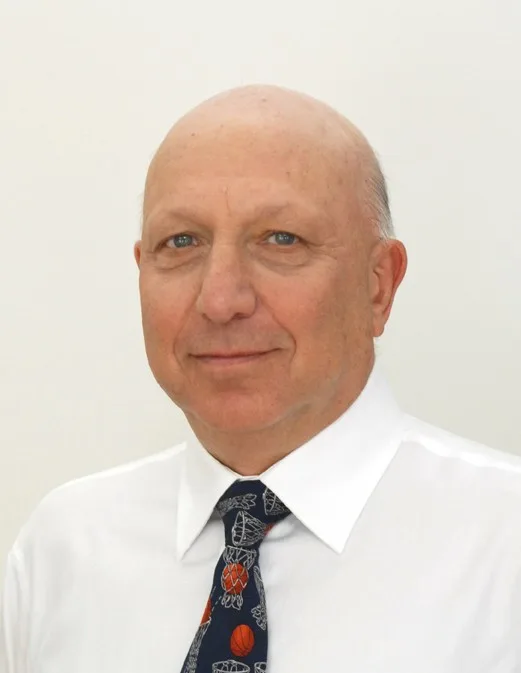 Pychotherapist Jonathan Berent in white shirt and colorful tie.