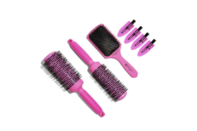 A collection of hot pink brushes and clips that raised money for cancer victims