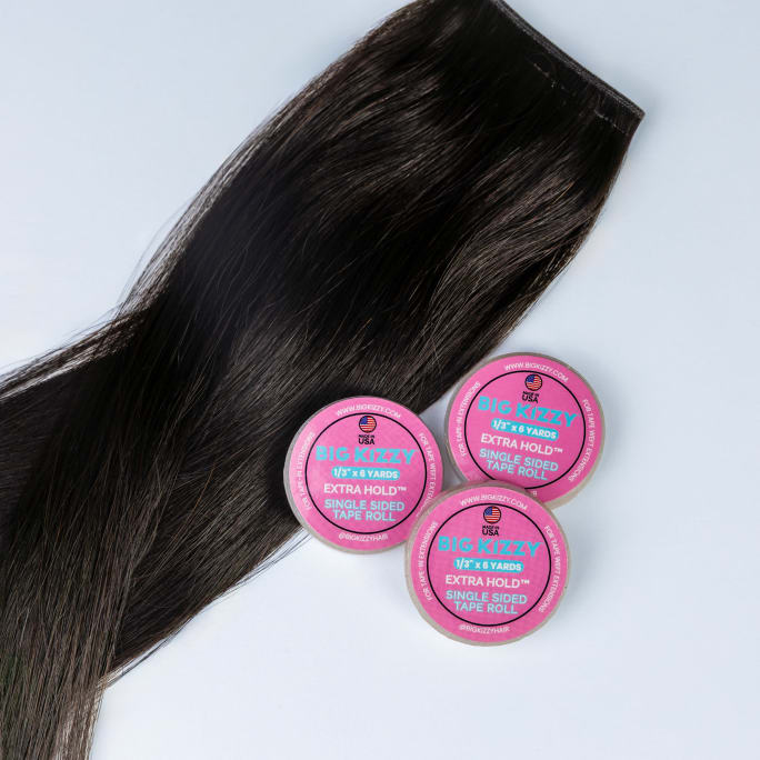 Brunette weft of hair extension and 3 rolls of Big Kizzy extra hold single sided tape