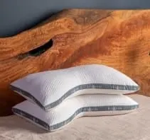 side sleeping pillows on bed