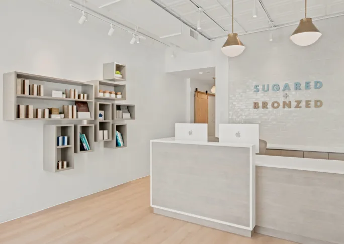The front desk and retail area of SUGARED + BRONZED