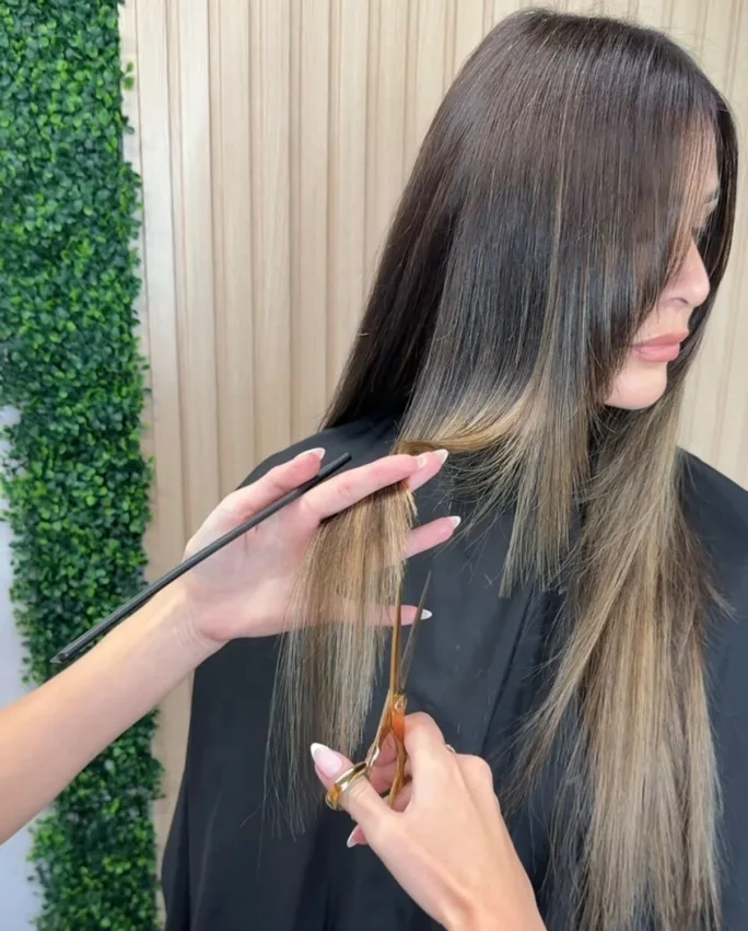 hands cutting hair