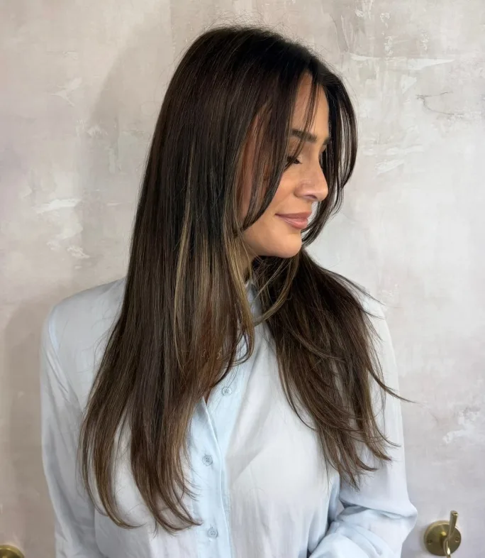 a woman with long brown hair