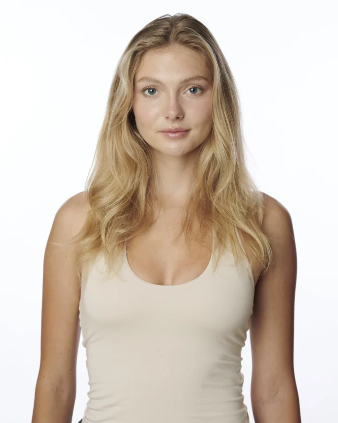A blonde model in a white tshirt