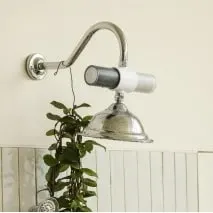 Shower head sticking out of wall