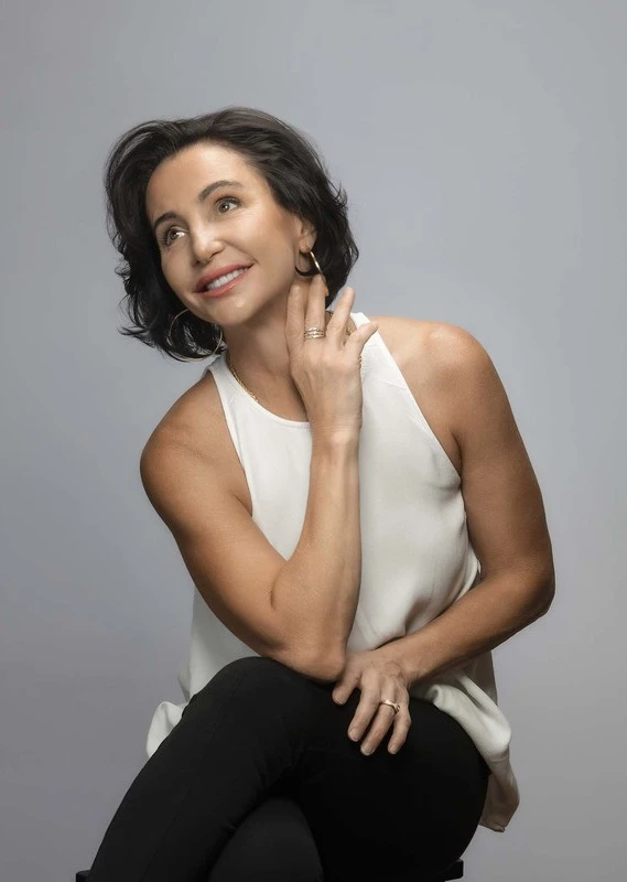 Bacio Salon Owner Yvette Cannas in an elegant post.