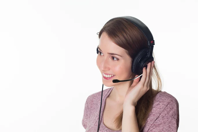 A receptionist on a headset