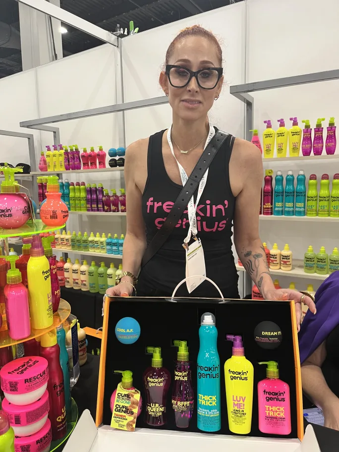 Jami Zabner at the Freakin' Genius Haircare booth, showcasing their latest launch at Cosmoprof North America 2025.Kristin Banos at the Freakin' Genius Haircare booth, showcasing their latest launch