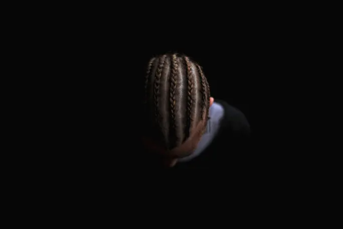 A closeup of tight braids