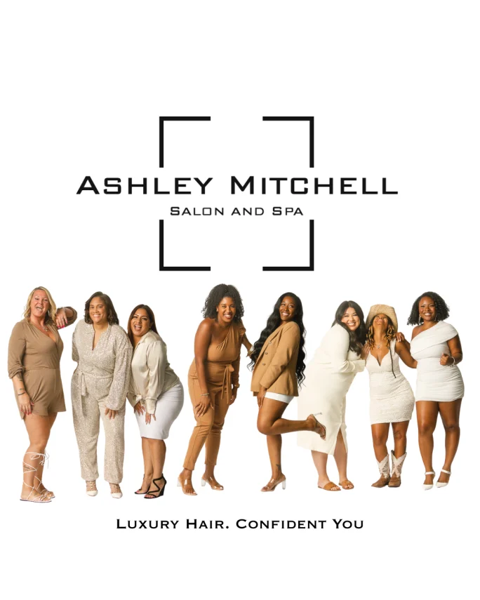 Lined up under the salon logo, the team from Ashley Mitchell Salon and Spa.