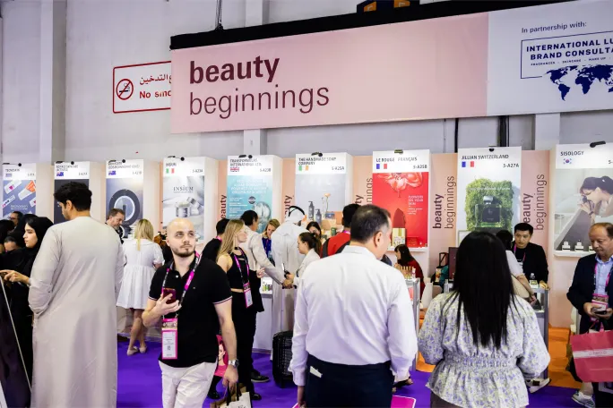 Crowded trade show floor with attendees walking through aisles at Beautyworld Middle East 2025.