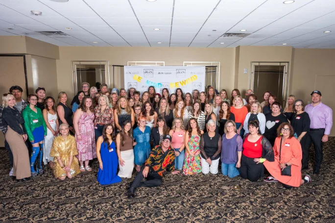 A large group of employees from James Griffith Salon pose at their annual Summit.