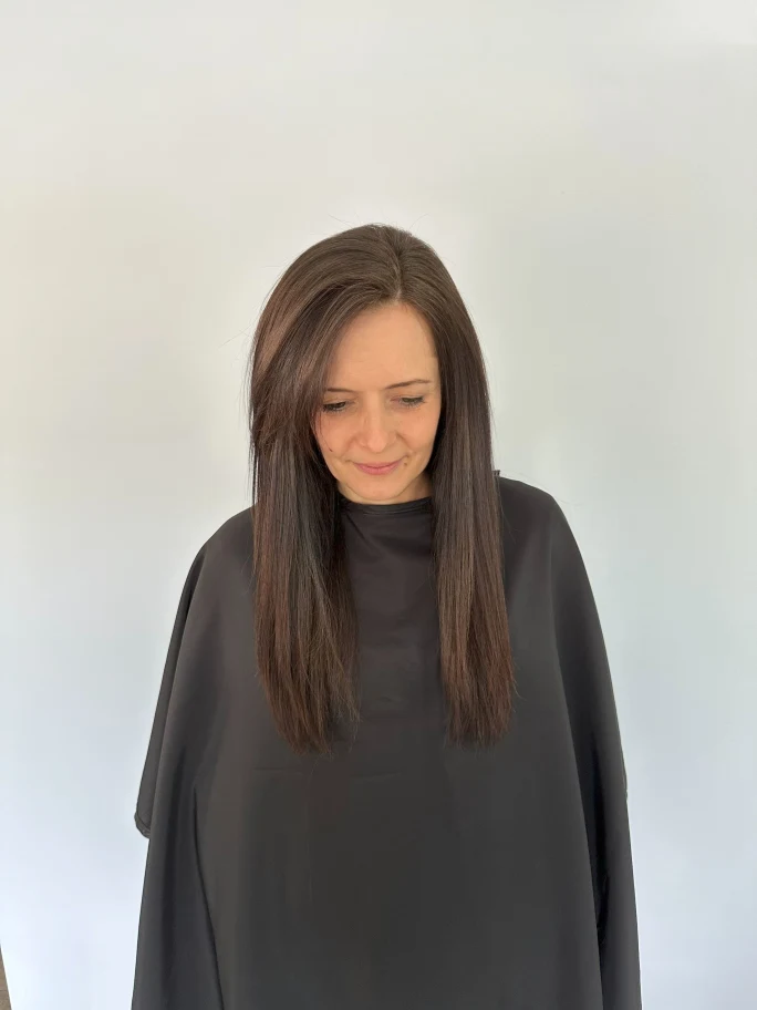 A woman with smooth hair.
