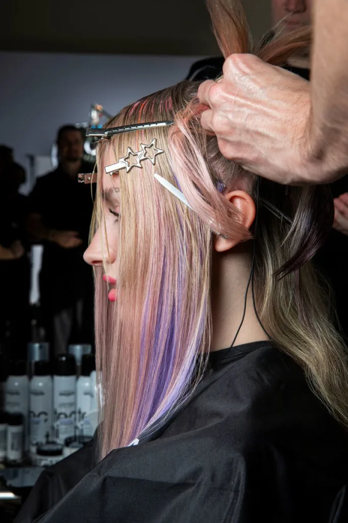A melody of colors shine in a model's hair