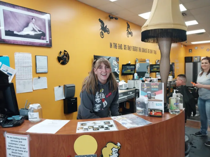 A receptionist at The Man Shop