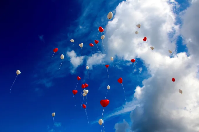 Balloons floating to the sky