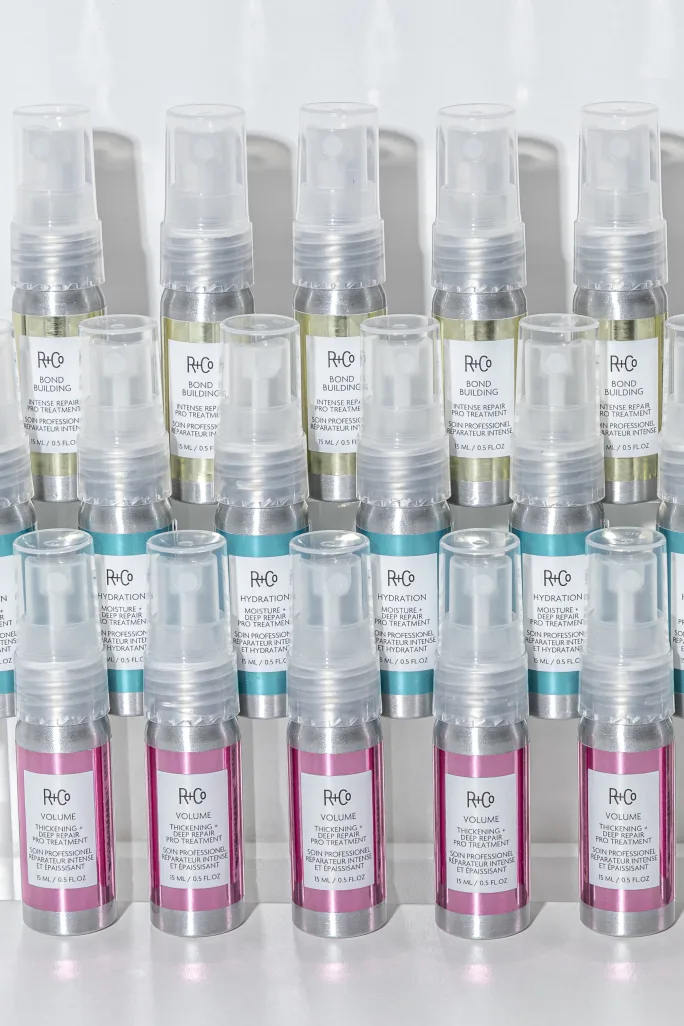 Rows of R+Co's new pro treatments offer skincare-inspired solutions that transform hair in minutes.