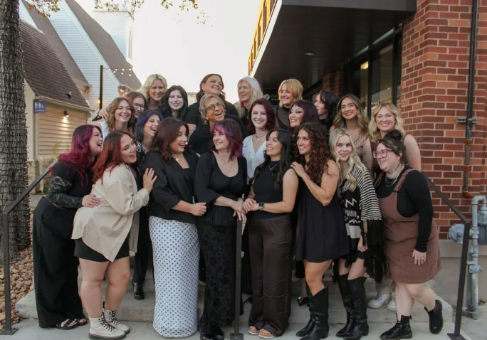 The team from Razmataz Salon look toward owner Rachel Stearns.