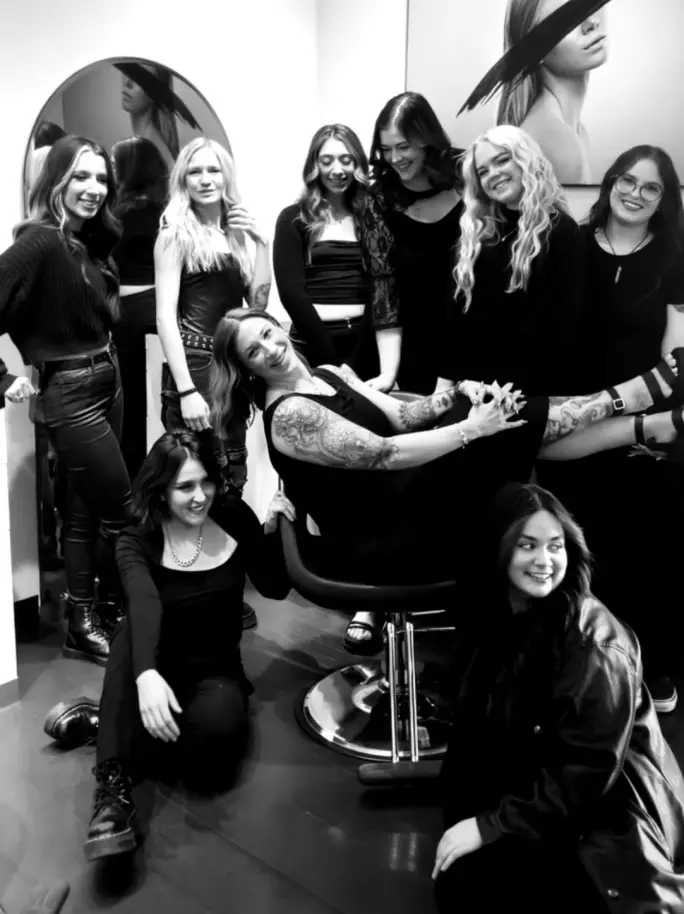 A black and white shot of the team from Sahair Salon.