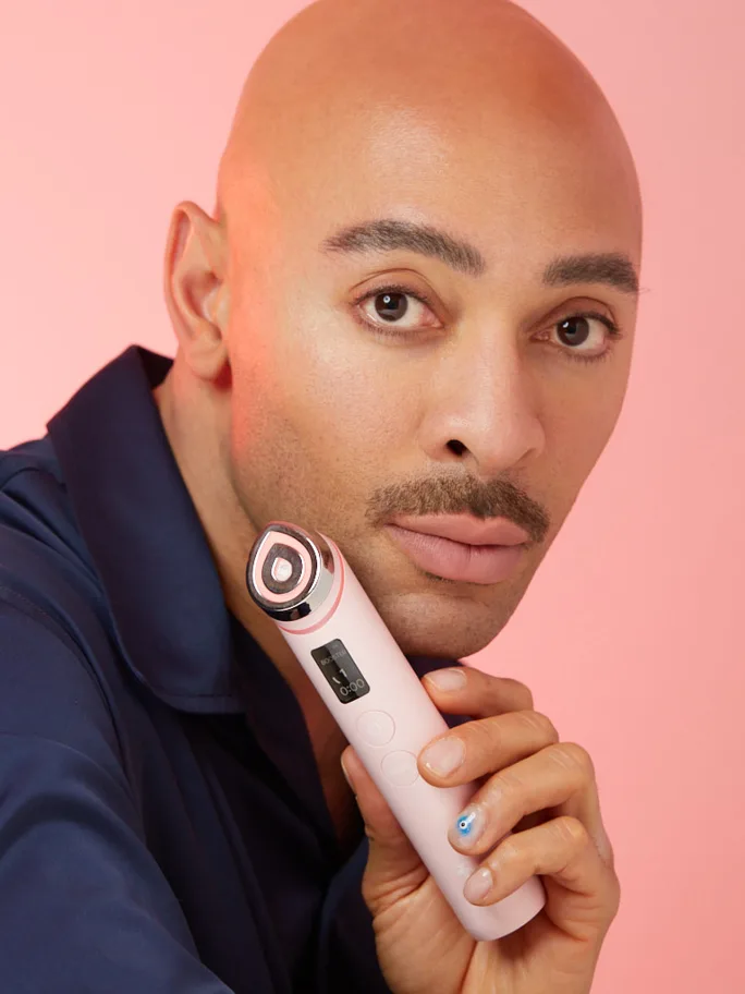 A man holding a medical device.