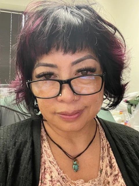 A woman with glasses