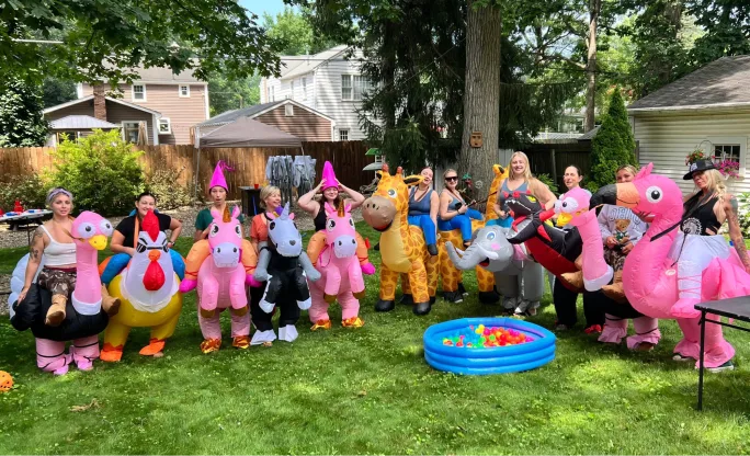 A team from The Shoppe An Alea Michelle Salon get ready for the obstacle course during their team-building field day.