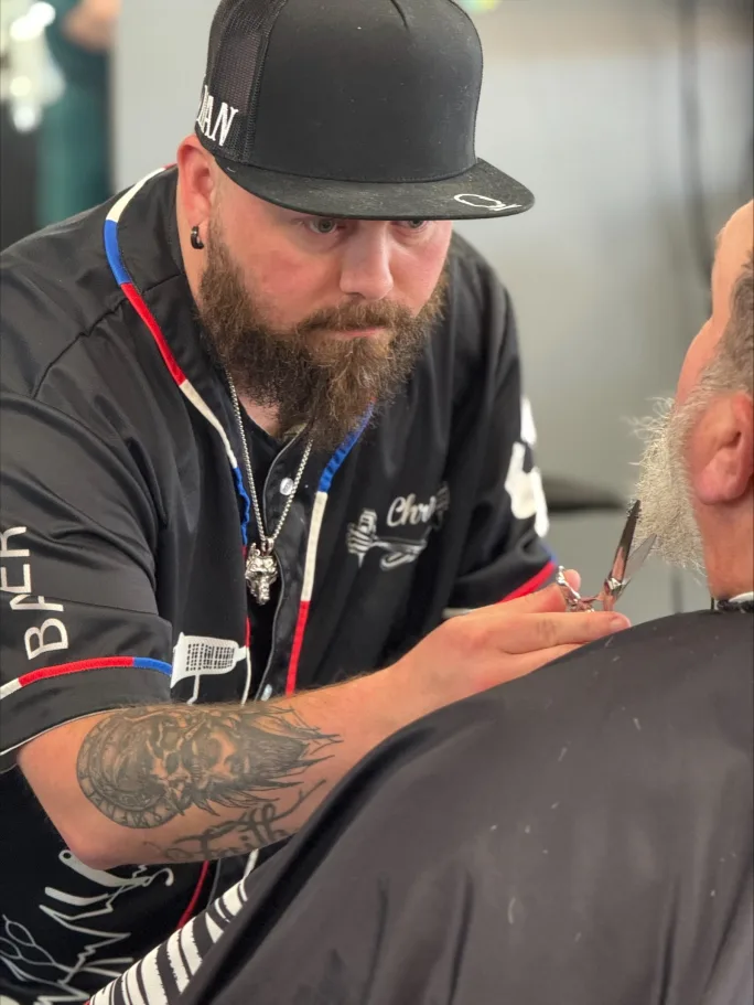 A barber at The Man Shop.