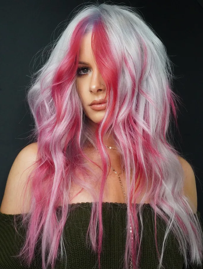 a woman with blonde and pink hair