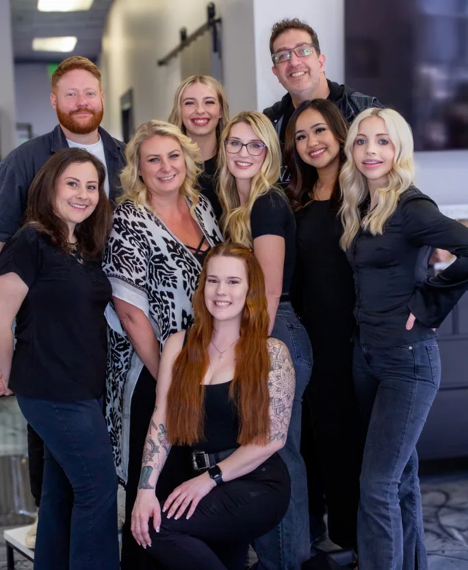 Team members from Vault Salons pose.