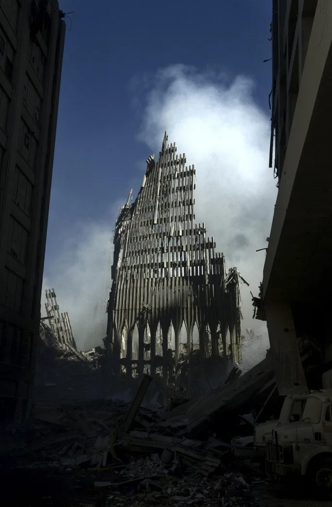 A section of the World Trade Center against the backdrop of a sunny sky after 9/11.