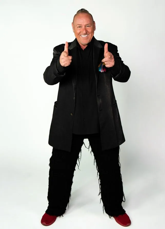 A man doing the thumbs up sign