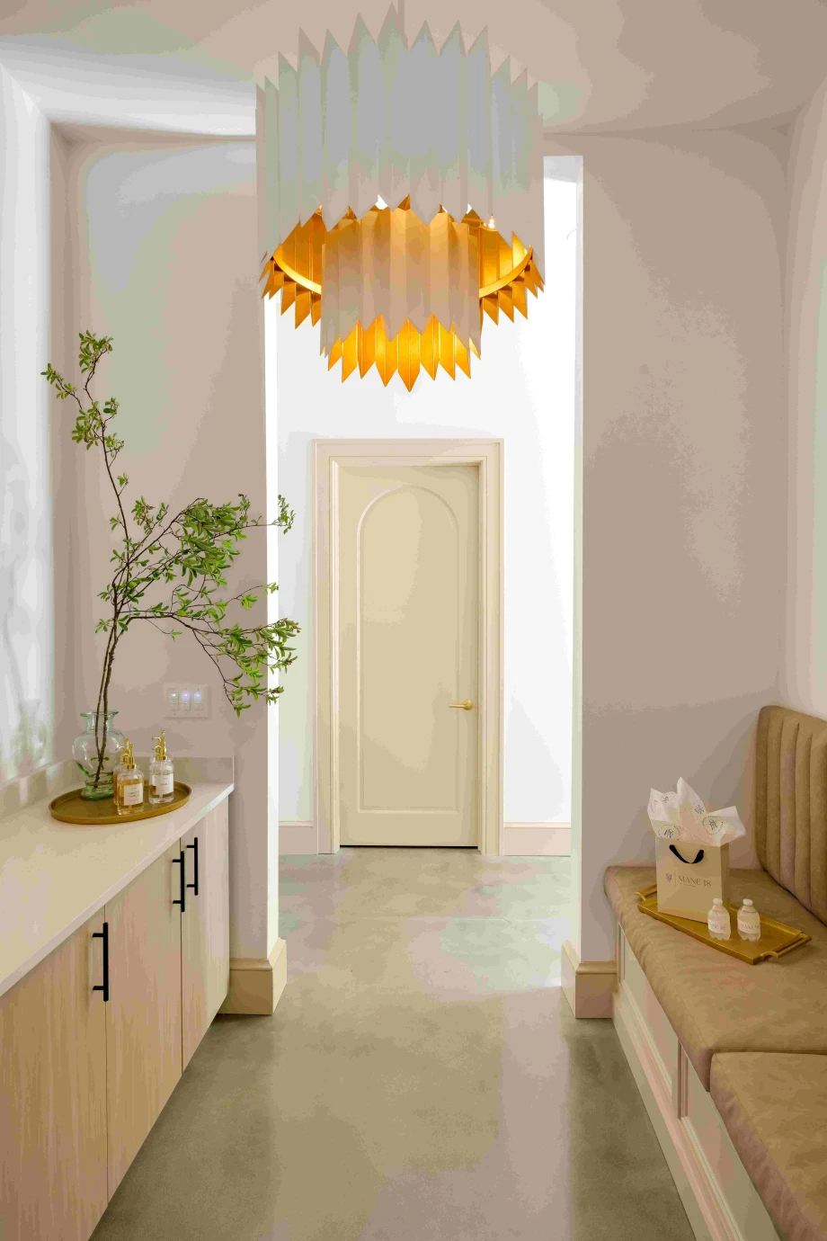 A white and gold modern chandelier