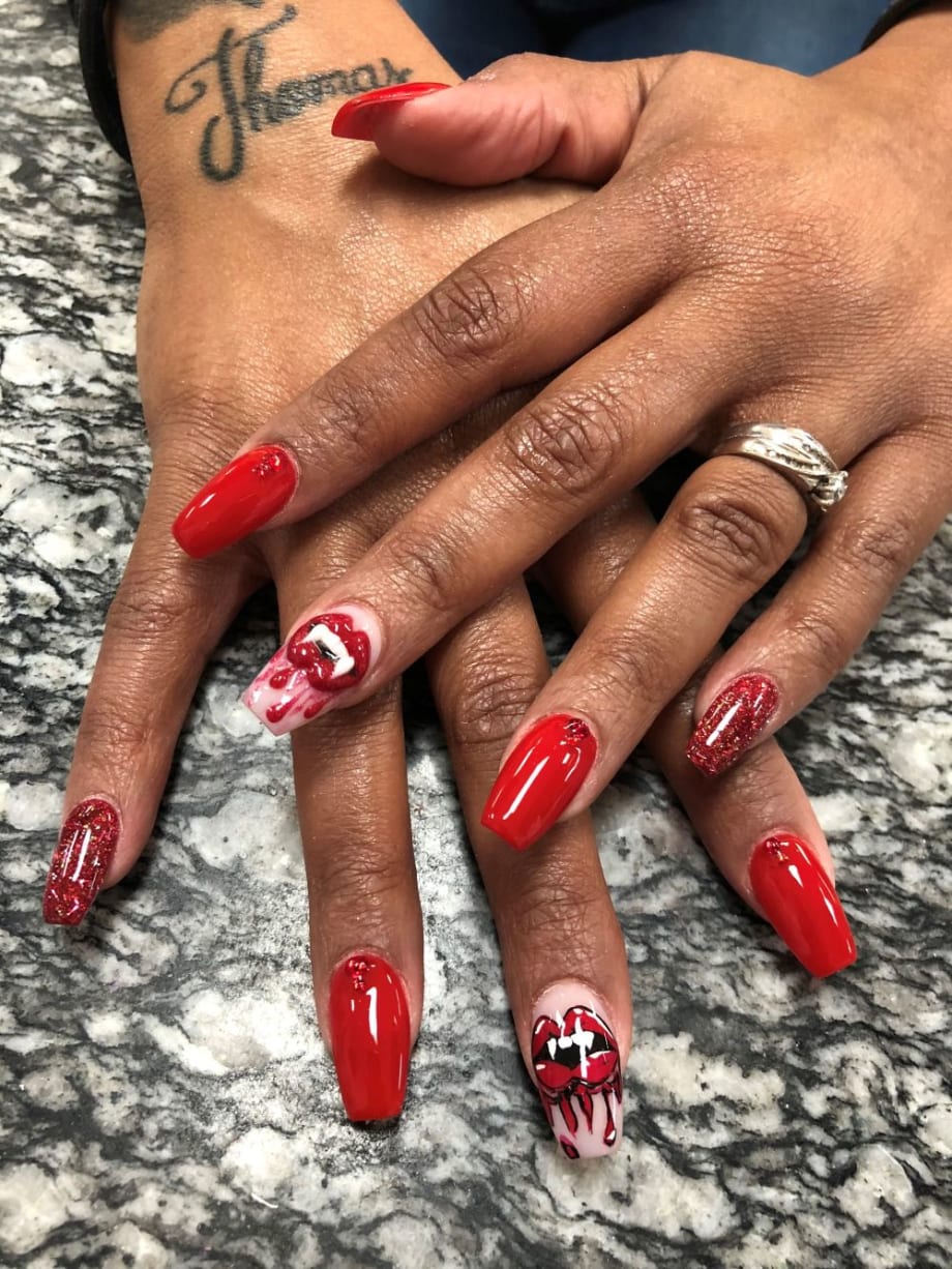 Day 279: Vampire Fang and Animal Print Nail Art