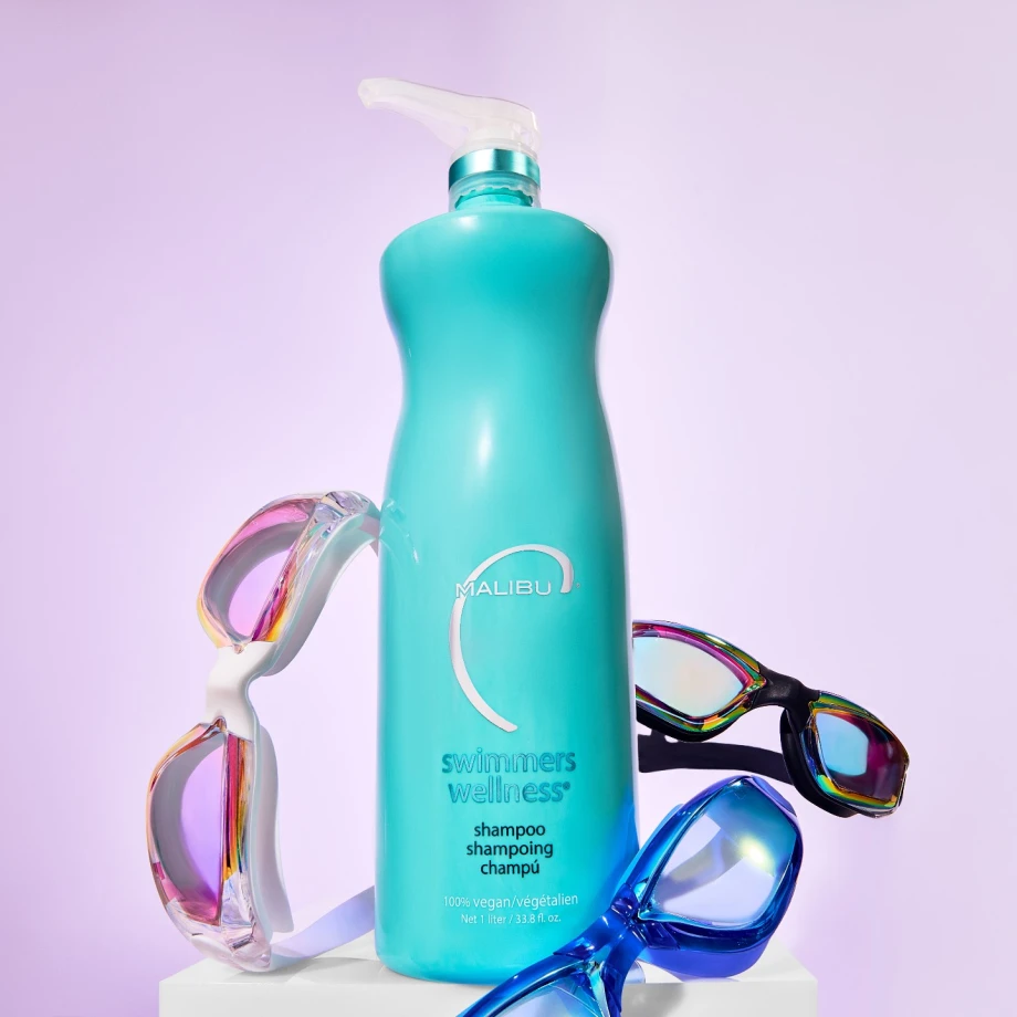A hair care product package with swim goggles