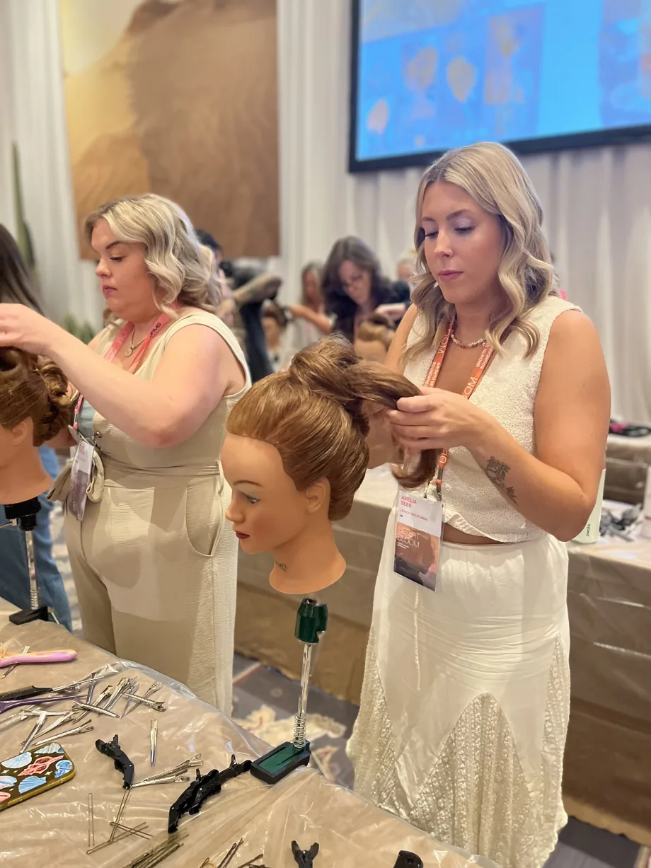 Attendees at Paul Mitchell’s Desert Bloom event in Las Vegas, a global gathering of hairstylists and salon professionals celebrating education, artistry, and community